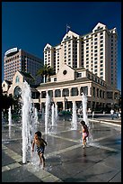 Children, fountain, Plaza de Cesar Chavez  and Fairmont Hotel. San Jose, California, USA (color)