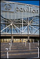 Facade of the HP Pavilion with person walking out. San Jose, California, USA (color)