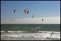 Group of kitesurfers, Waddell Creek Beach. California, USA (color)