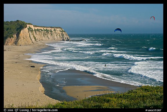 Beach and kite surfers from above, Scott Creek Beach. California, USA
