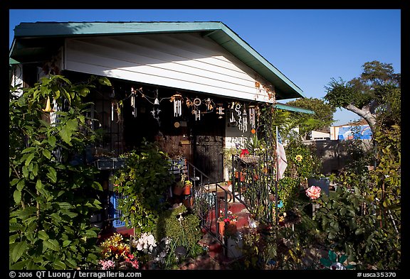 House and frontyard, Watts. Watts, Los Angeles, California, USA (color)