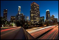 Bridge, Harbor Freeway, and skyline at nightfall. Los Angeles, California, USA
