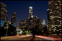 Traffic lights and skyline at night. Los Angeles, California, USA