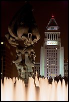 Peace on Earth sculpture, fountain, and City Hall at night. Los Angeles, California, USA