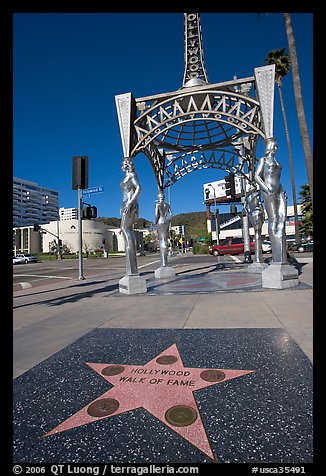 Star from the Hollywood walk of fame and gazebo with statues of actresses. Hollywood, Los Angeles, California, USA