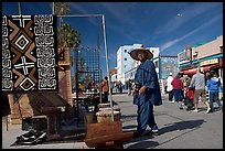 Man selling crafts on Venice Boardwalk. Venice, Los Angeles, California, USA (color)