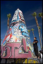 Man creating  graffiti art. Venice, Los Angeles, California, USA