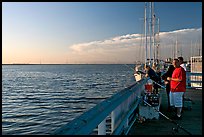 Fishing in the Port of Redwood, late afternoon. Redwood City,  California, USA (color)