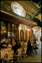 Italian restaurant with diners by night. Burlingame,  California, USA (color)