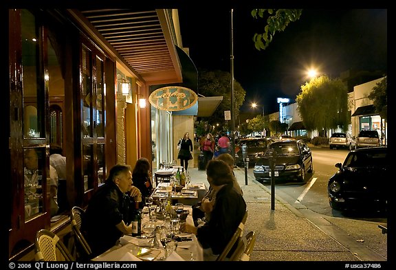Sidewalk with Outdoor restaurant table and people walking. Burlingame,  California, USA (color)
