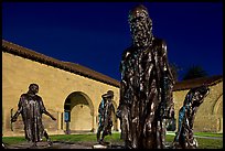Rodin Burghers of Calais in the Main Quad at night. Stanford University, California, USA (color)