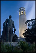 Columbus statue and Coit Tower, dusk. San Francisco, California, USA (color)