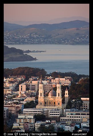 St Ignatius church, USF, and San Francisco Bay at sunset. San Francisco, California, USA