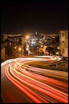 Light blurs on Lombard Street at night. San Francisco, California, USA