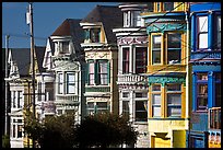 Row of brightly painted Victorian houses, Haight-Ashbury District. San Francisco, California, USA (color)