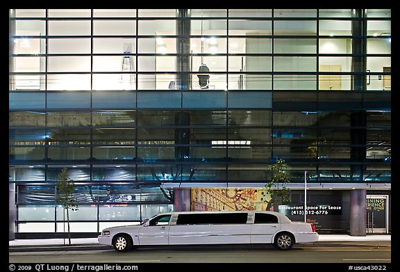 Limousine and glass building. San Francisco, California, USA (color)