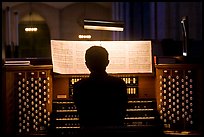 Organist and musical score, Grace Cathedral. San Francisco, California, USA ( color)