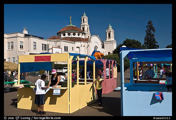 School fair booths and Mission Dolores in the background. San Francisco, California, USA