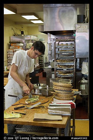 Man preparing pizza, Haight-Ashbury district. San Francisco, California, USA (color)