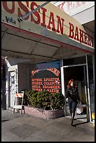 Russian Bakery with redhead woman walking out. San Francisco, California, USA ( color)