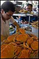 Man preparing crabs, Fishermans wharf. San Francisco, California, USA ( color)