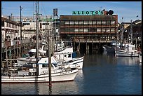 Aliotos restaurant and fishing fleet, Fishermans wharf. San Francisco, California, USA (color)