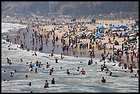 Throng of beachgoers, Santa Monica Beach. Santa Monica, Los Angeles, California, USA (color)