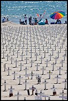 War memorial and families at edge of water on beach. Santa Monica, Los Angeles, California, USA ( color)