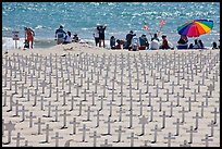 Wooden crosses, stars of David, and beachgoers. Santa Monica, Los Angeles, California, USA ( color)