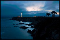 Coastal bluff with lighthouse at dusk, Point Arena. California, USA ( color)