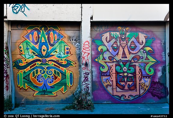 Two painted garage doors, Mission District. San Francisco, California, USA (color)