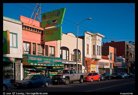 Shops, Mission Street, late afternoon, Mission District. San Francisco, California, USA