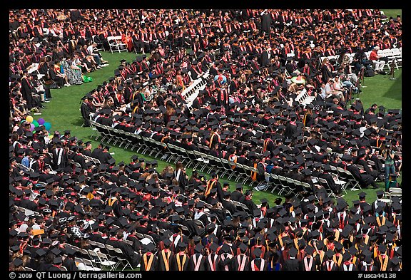 Large gathering of students in academic dress at graduation ceremony. Stanford University, California, USA (color)