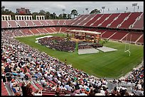 Commencement taking place in stadium. Stanford University, California, USA (color)