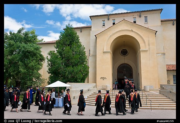Graduates walking single file into Memorial auditorium. Stanford University, California, USA (color)
