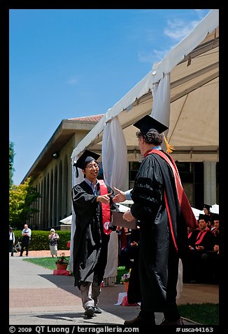 Student receiving handshake prior diploma award. Stanford University, California, USA (color)