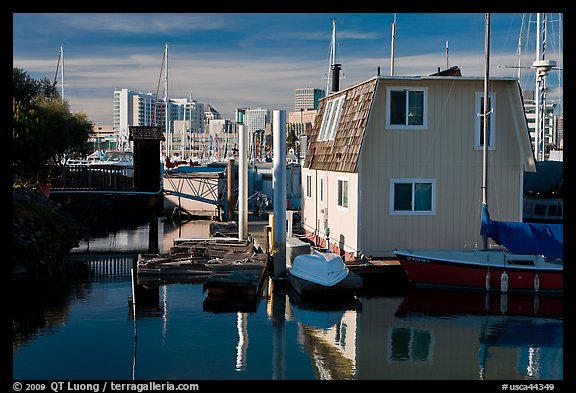 Houseboat and Oakland skyline. Oakland, California, USA