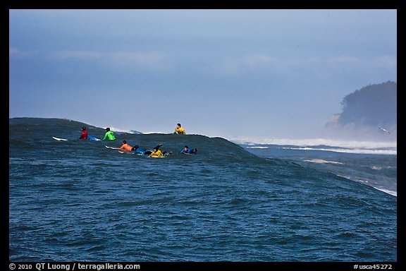 Surfers waiting for wave at Mavericks. Half Moon Bay, California, USA