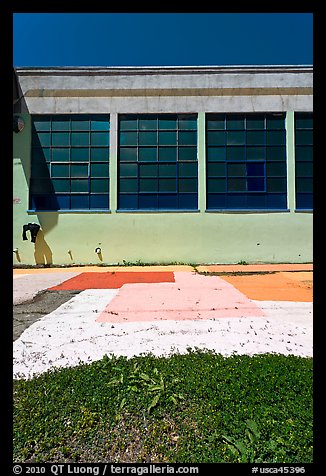 Sidewalk and industrial building facade. Berkeley, California, USA (color)