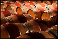 Rows of wine barrels in cellar, close-up. Napa Valley, California, USA