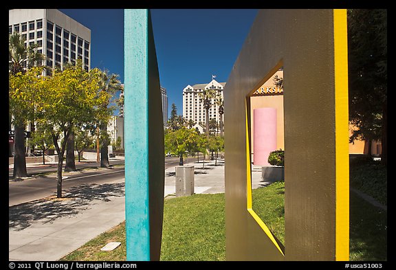 Downtown San Jose seen through colorful modern sculpture. San Jose, California, USA