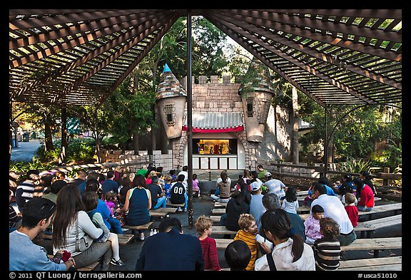 Families watch puppet performance, Happy Hollow Park. San Jose, California, USA