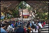 Families watch puppet performance, Happy Hollow Park. San Jose, California, USA ( color)