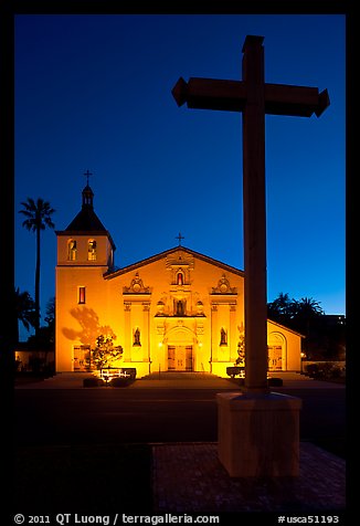 Cross and Santa Clara Mission at dusk. Santa Clara,  California, USA (color)