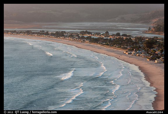 Surf, beach and town from above. California, USA