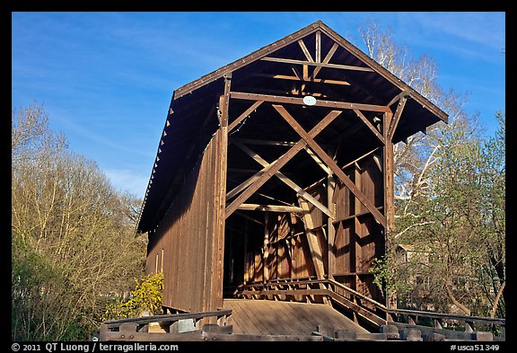 Brown truss covered bridge over the San Lorenzo River, Felton. California, USA (color)