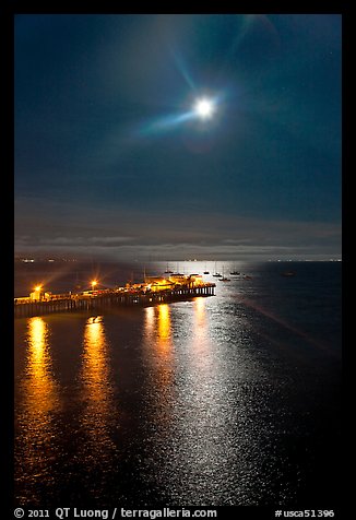 Moon and fishing pier by night. Capitola, California, USA (color)