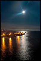 Moon and fishing pier by night. Capitola, California, USA (color)