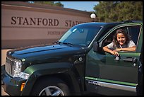 Student with new car. Stanford University, California, USA (color)