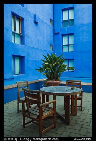 Tables and chairs in blue courtyard, Schwab Residential Center. Stanford University, California, USA (color)